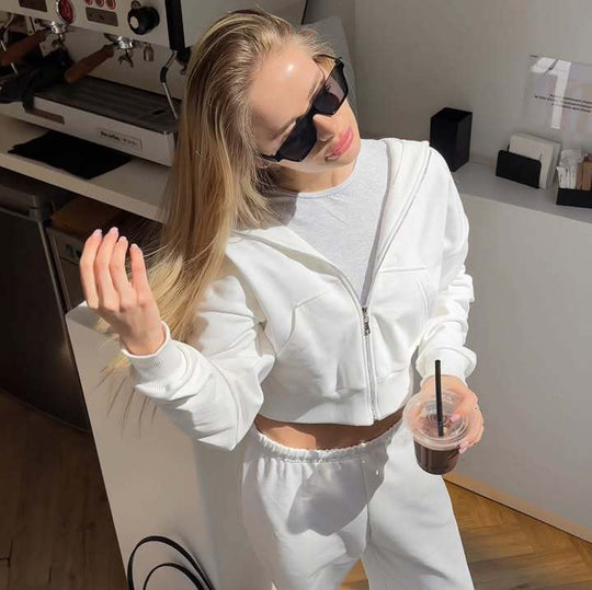 Damen Cropped Kapuzen-Sweatjacke mit Kängurutasche und tailliertem Rippbund EB