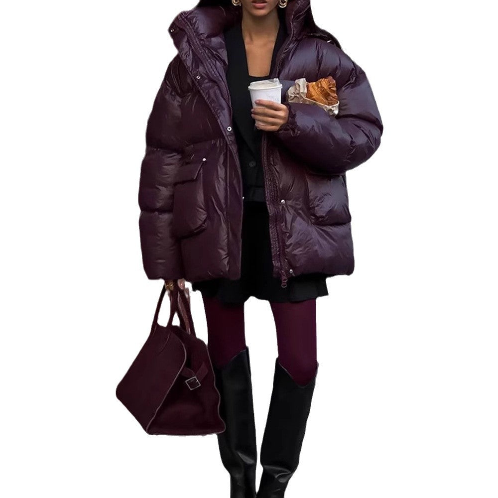 Damen Oversized Daunenjacke mit sichtbarem Steppdesign und hohem Kragen EB