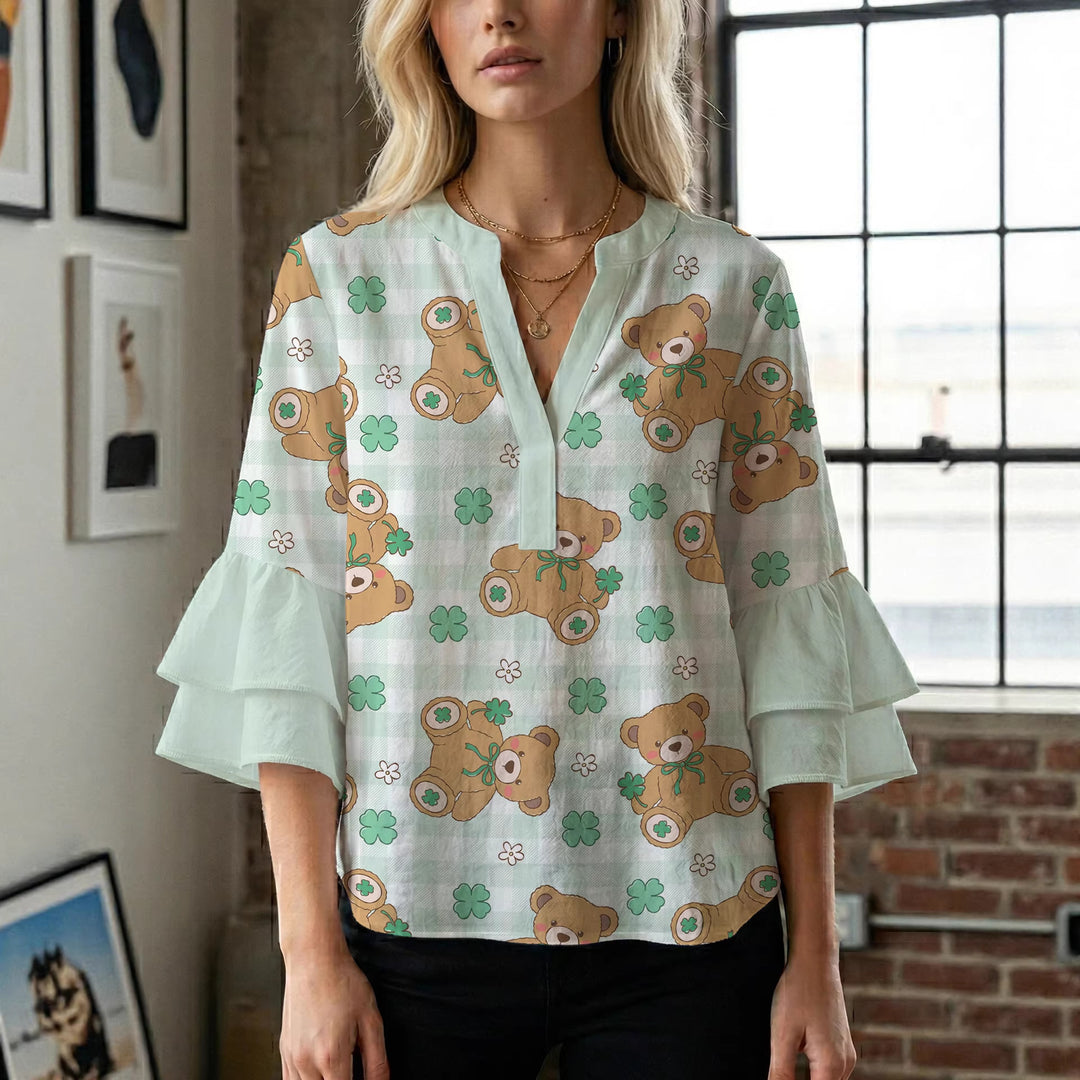 Damen Bluse mit voluminösen Flügelärmel und intensivem Blattmuster EB