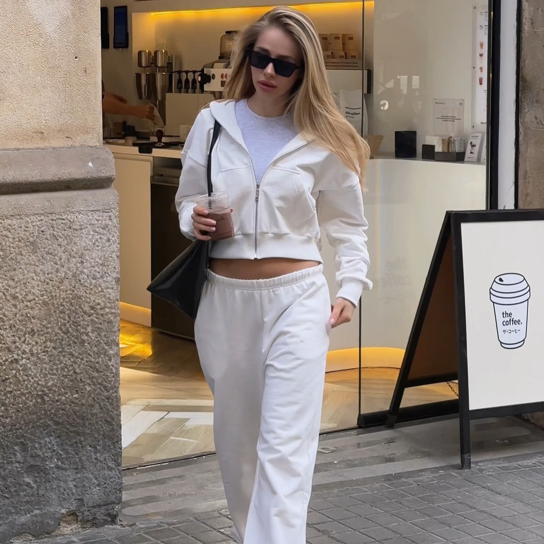 Damen Cropped Kapuzen-Sweatjacke mit Kängurutasche und tailliertem Rippbund EB