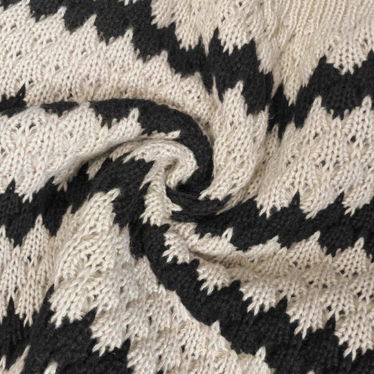 Damen Grobstrickpullover mit geometrischem Muster und voluminösen Ärmeln EB