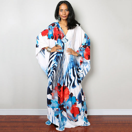 Damen Maxikleid mit kunstvollem Pfauenmuster und seitlichen Schlitzen Heidi Mode