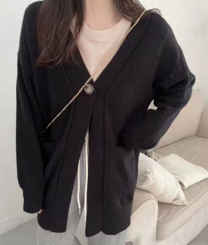Damen Gemütlicher Strickcardigan mit großen Taschen und asymmetrischem Schnitt EB