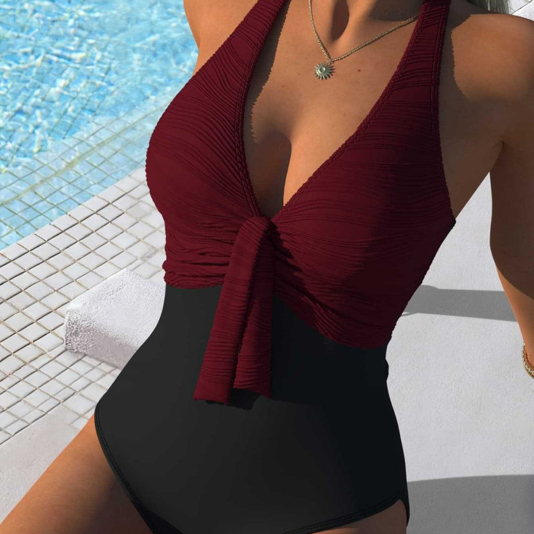 Damen Einteiler Badeanzug mit raffinierten Wickeldetails und hohem Schnitt EB