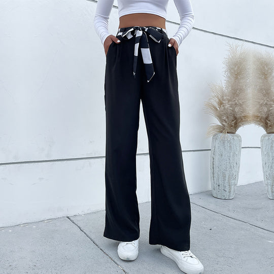Damen weite Stoffhose mit Bindegürtel und seitlichen Taschen EB