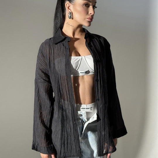 Damen lässige Hemdbluse mit oversized Schnitt und Knopfdetails EB