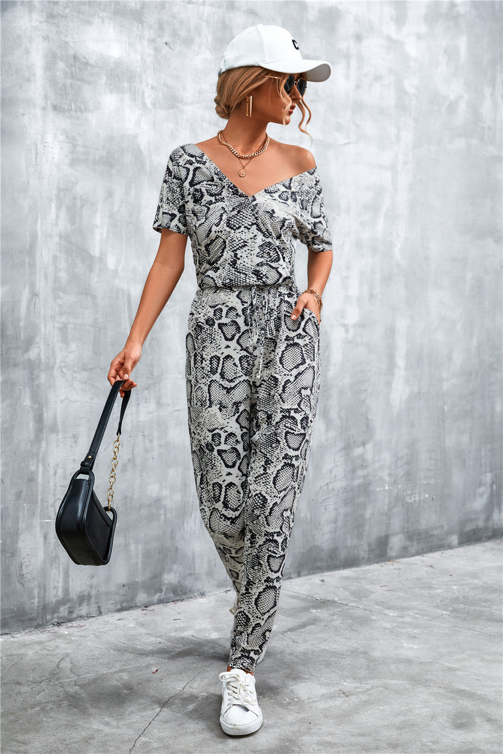 Damen elegante Jumpsuit im Snake-Print-Stil mit Taillengürtel und V-Ausschnitt EB