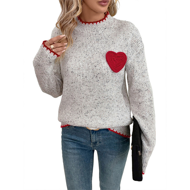 Damen Strickpullover mit Herzapplikation und dekorativem Saum EB