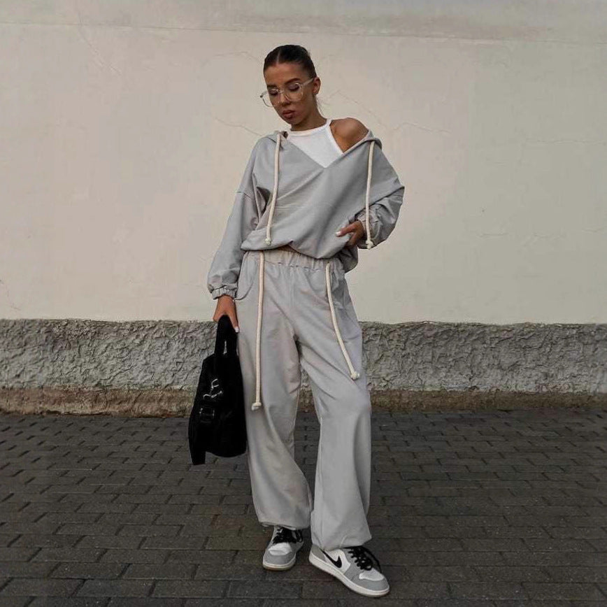Damen lässiges Sport-Set mit Kapuze und praktischen Taschen EB