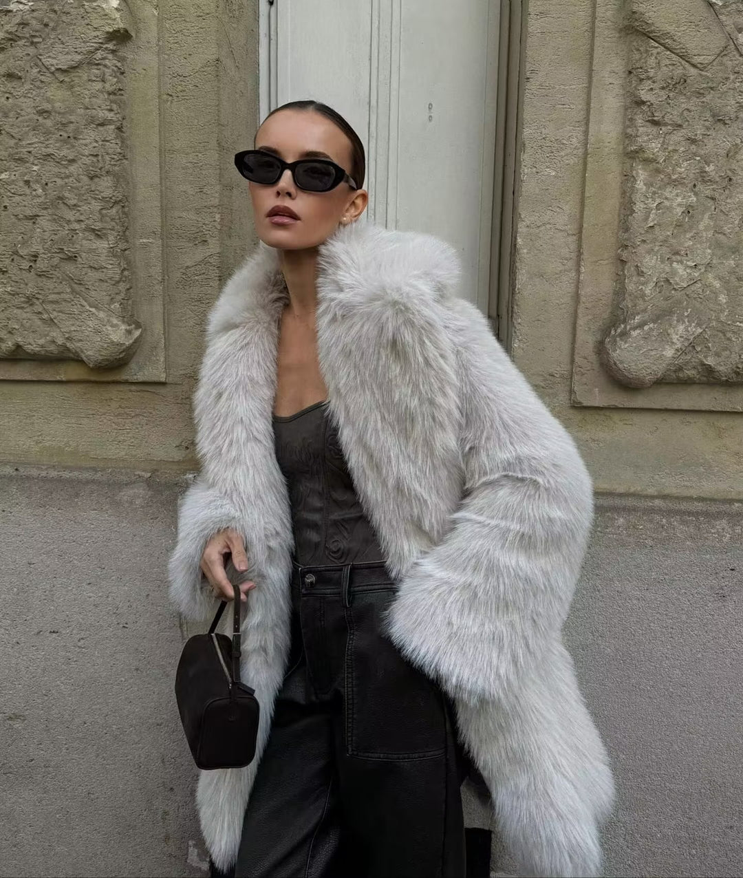 Damen Flauschige Kunstpelzjacke mit weiter Silhouette EB