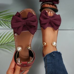 Damen Sandalen mit dekorativem Schleifenakzent und eleganten Perlendetails EB