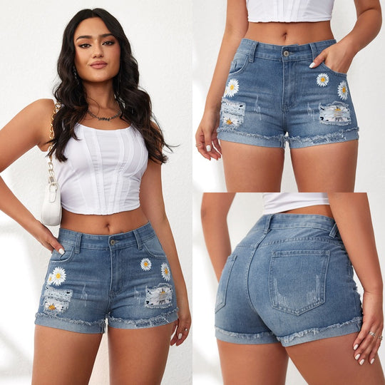 Damen Jeansshorts mit auffälligen Blumenstickereien und lässigem Saum EB