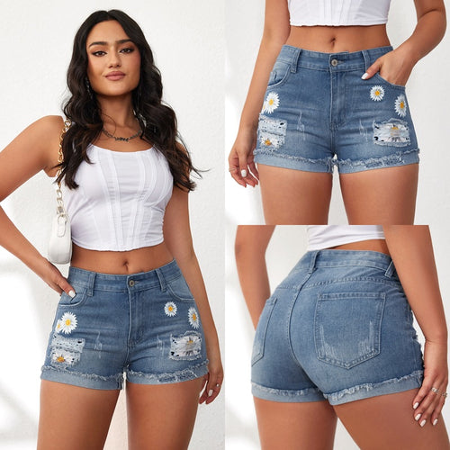 Damen Jeansshorts mit auffälligen Blumenstickereien und lässigem Saum EB