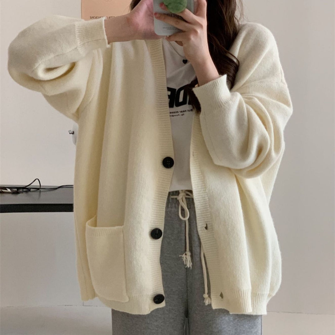 Damen Gemütliche Strickjacke mit weiten Ärmeln und praktischen Taschen EB