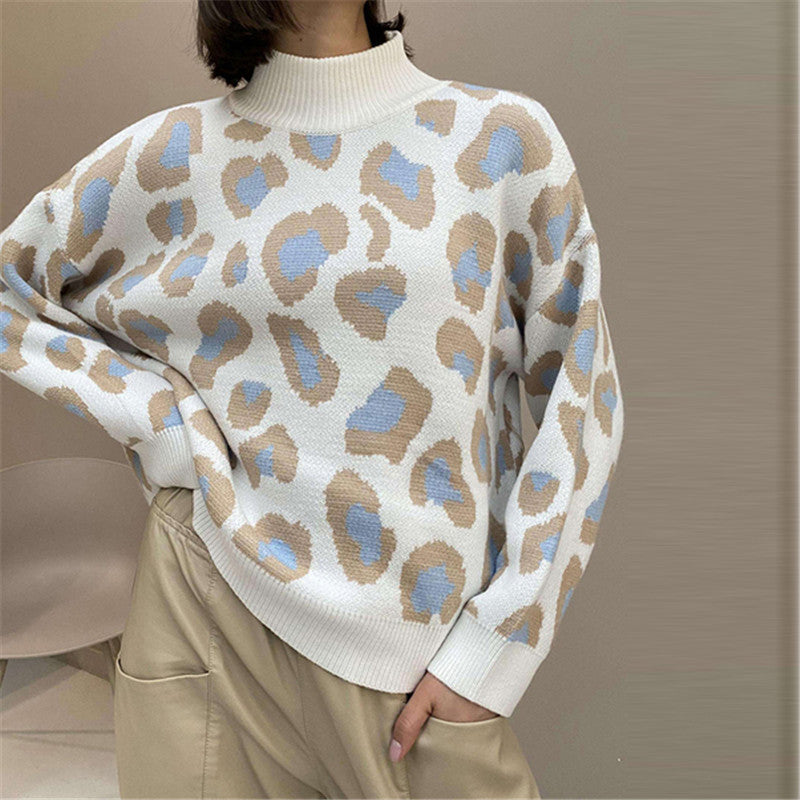 Damen Oversize Rollkragenpullover mit Leo-Jacquard und Rippbündchen EB