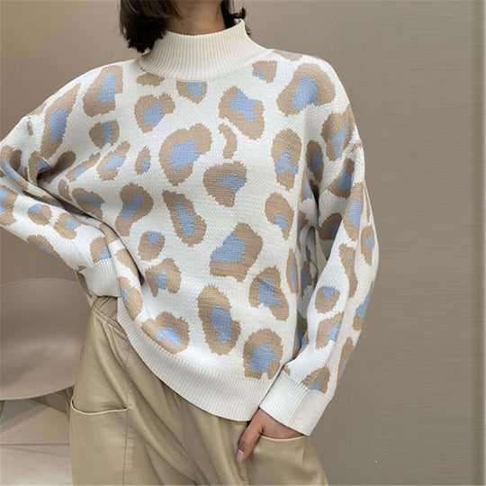 Damen Oversize Rollkragenpullover mit Leo-Jacquard und Rippbündchen EB