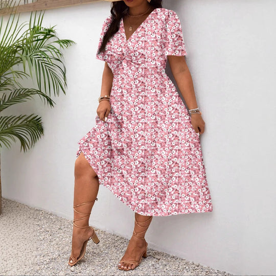Damen Midi-Kleid mit Blumenmuster und vorteilhaftem Schlitz EB