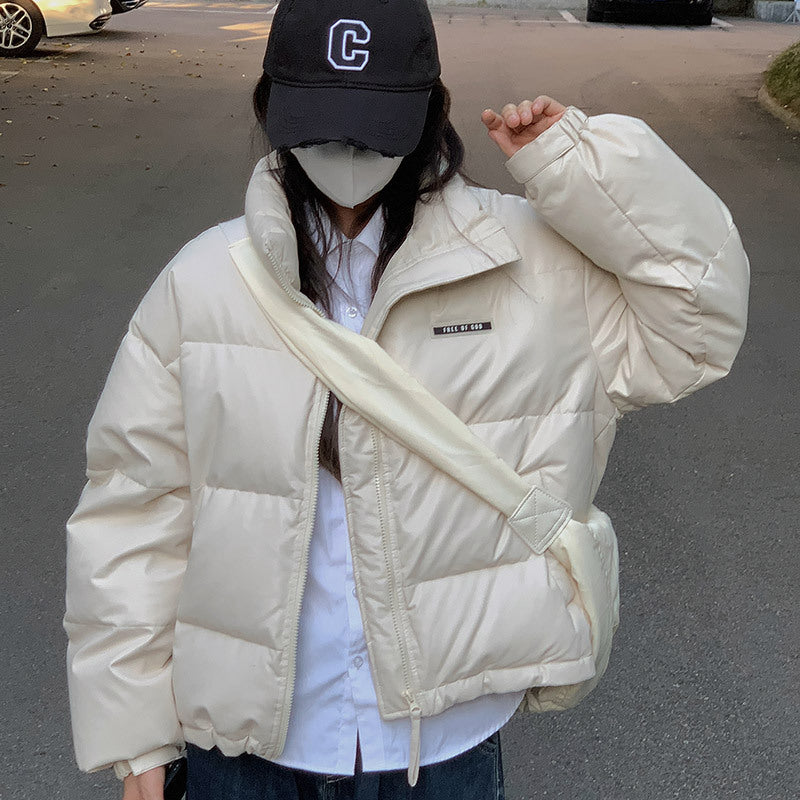 Damen Modische sowie isolierte Pufferjacke mit hochschließendem Kragen und seitlichen Reißverschlusstaschen EB