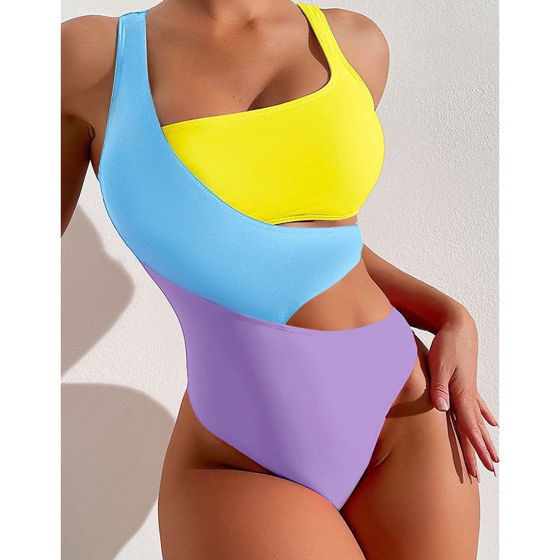 Damen Einteiler Badeanzug mit asymmetrischem Design und bunten Kontrastflächen EB