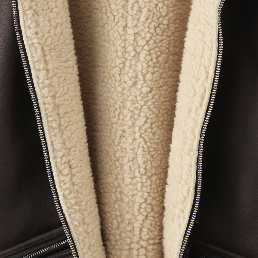 Damen Kunstlederjacke mit warmem Sherpa-Futter und praktischen Reißverschlusstaschen EB