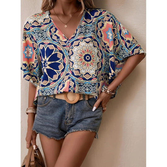 Damen Oversized Bluse mit kontrastvollem Blumenmuster EB