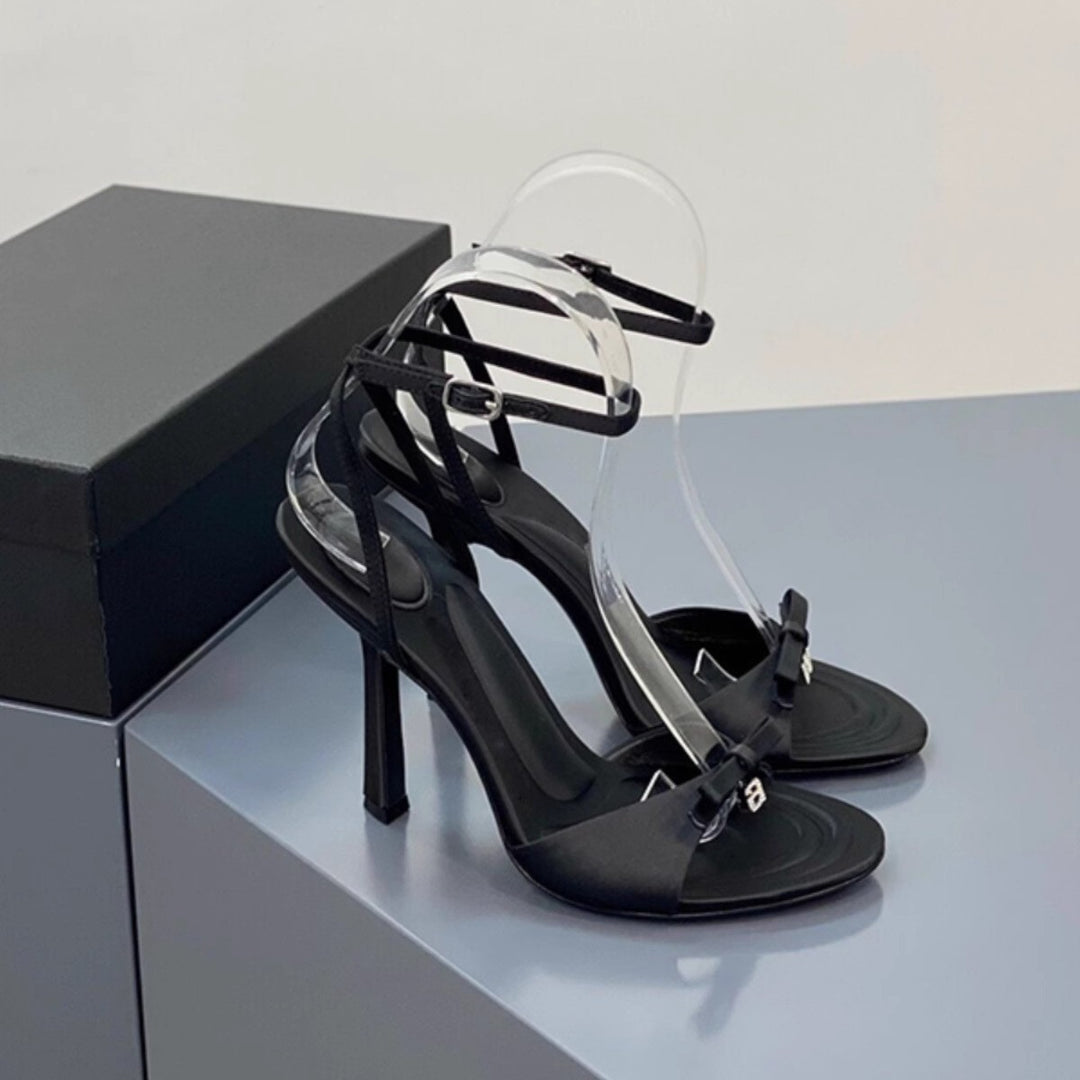 Damen elegante High Heel Sandalen mit transparentem Riemen und stilvollen Schleifen EB