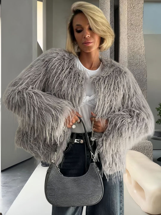 Damen Modische Kunstpelzjacke mit voluminösen Ärmeln EB