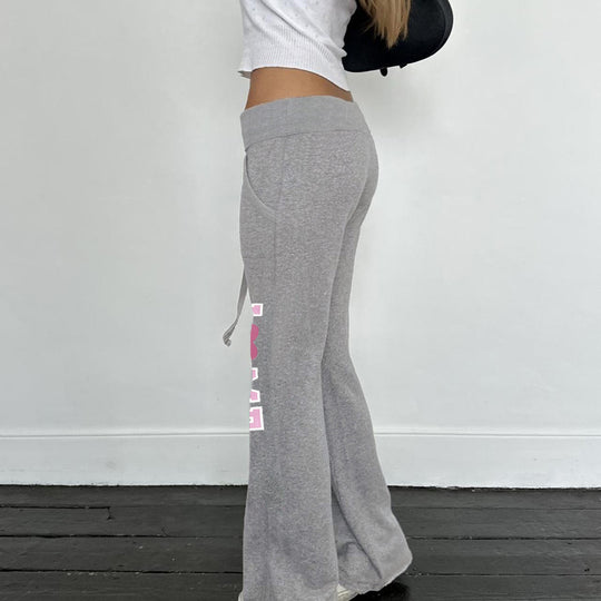 Damen nan weiche Flared-Jogginghose mit Kordelzug, Eingrifftaschen und auffälligem Love-Print EB