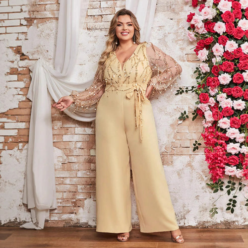 Damen Jumpsuit mit funkelnden Verzierungen und transparenten Ärmeln EB
