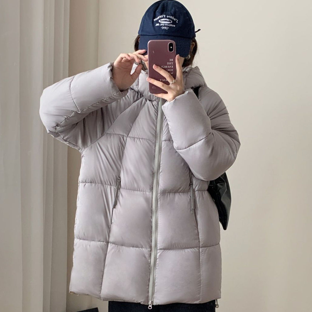 Damen Übergroße Pufferjacke mit Kapuze und praktischen Eingrifftaschen EB