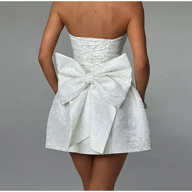 Damen kurzes Kleid mit strukturiertem Oberteil und verspieltem Schleifendetail EB