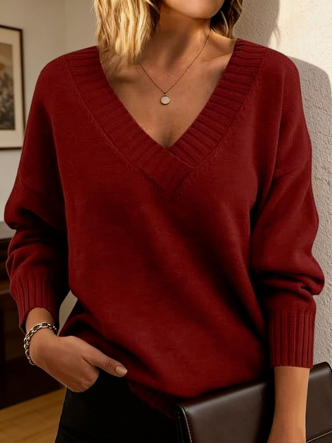 Damen Feinstrickpullover mit tiefem V-Ausschnitt und überschnittener Schulter EB