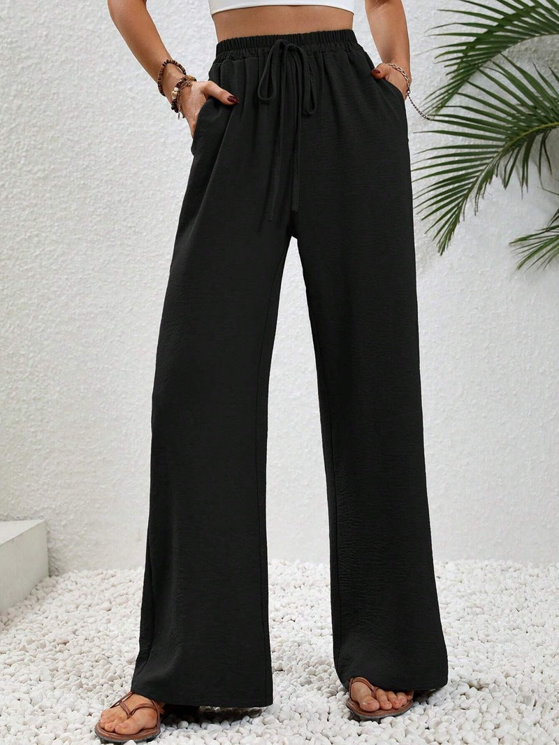 Damen Lässige, Breite Freizeithose mit Elastischem Bund und Seitlichen Taschen EB