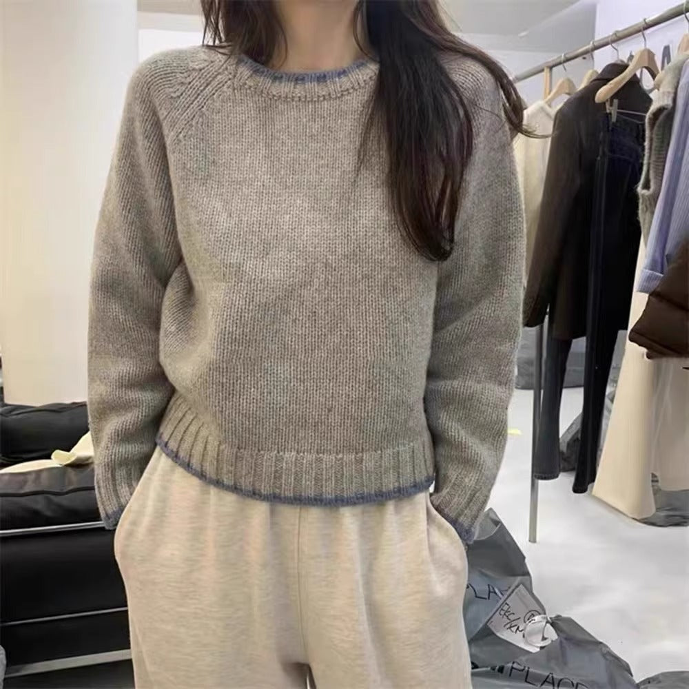 Damen Modischer Pullover mit strukturiertem Saum und kontrastierenden Ärmeln EB