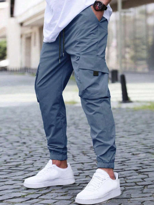 Herren nan technische Travel-Joggerhose mit integriertem Sicherheitsfach elastischem Tunnelzugbund und wasserabweisender Beschichtung EB