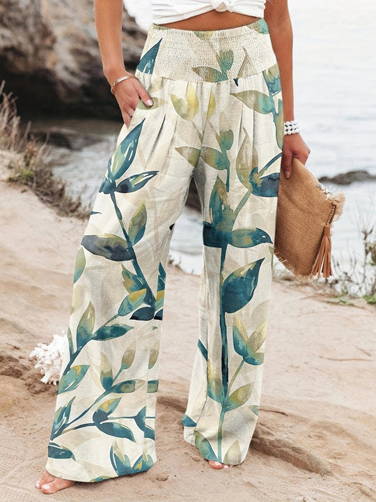 Damen Weit geschnittene Strandhose mit floralem Motiven und elastischem Bund EB