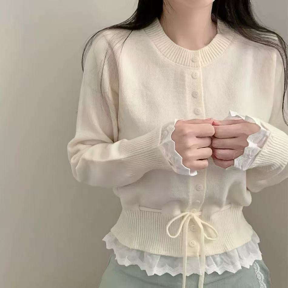 Damen kuscheliger Strickjacke mit fransigen Details und Bändchen EB