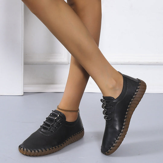 Damen handgenähter Komfort-Sneaker mit elastischer Schnürung und profilierter Kautschuksohle EB