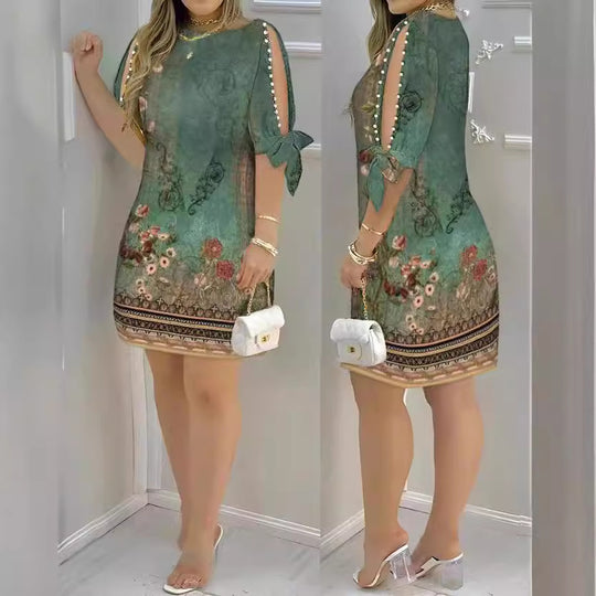 Damen Kleid mit floralen Mustern und offenen Schulterdetails EB