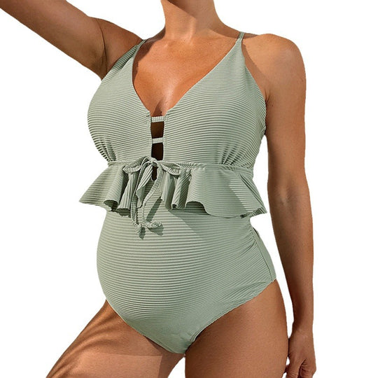 Damen Einteiler Badeanzug mit femininem Rüschendesign und modischem Cut-Out EB