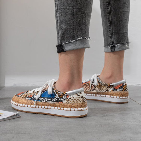 Damen Sneaker mit Korksohle und buntem Schlangenmuster EB