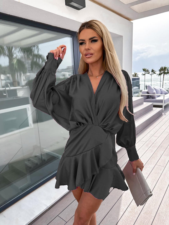 Damen Wickelkleid mit voluminösen Ärmeln und schwingendem Saum EB