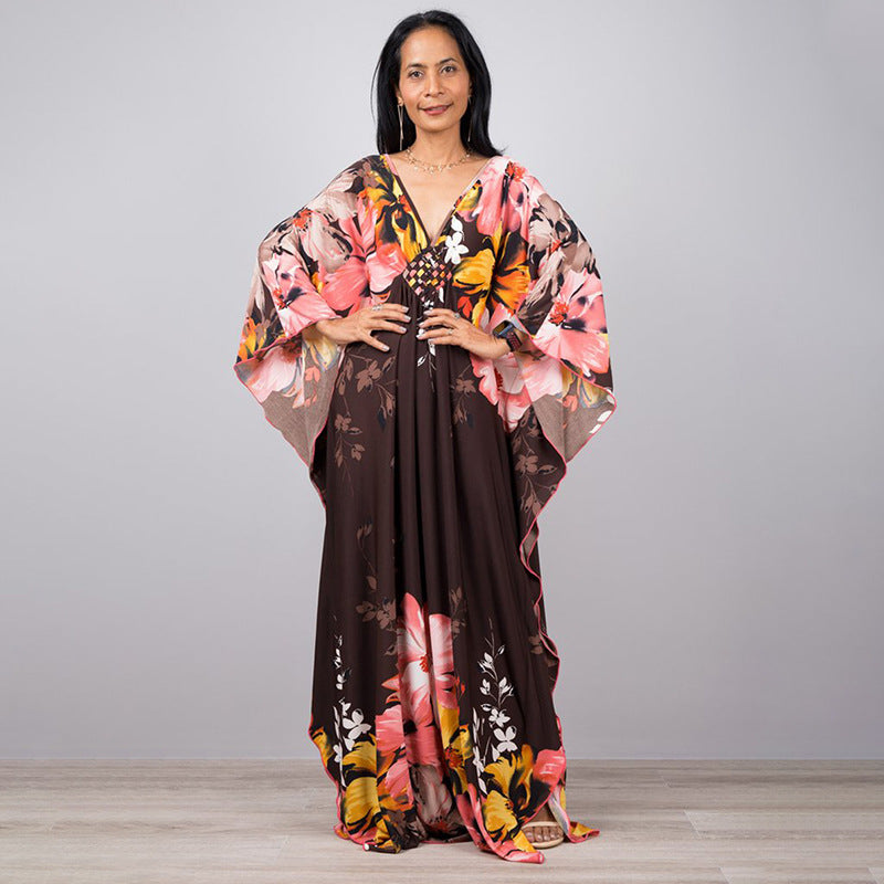 Damen Maxikleid mit kunstvollem Pfauenmuster und seitlichen Schlitzen Heidi Mode
