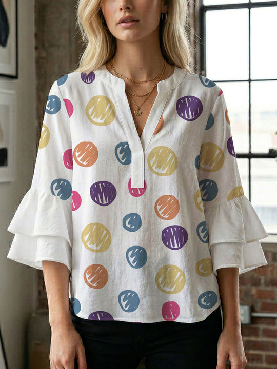 Damen Bluse mit voluminösen Flügelärmel und intensivem Blattmuster EB