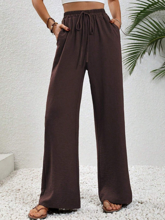 Damen Lässige, Breite Freizeithose mit Elastischem Bund und Seitlichen Taschen EB