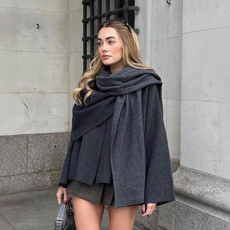 Damen nan zweilagiger Strickponcho mit asymmetrischem Saum und dekorativem Knopfkragen EB