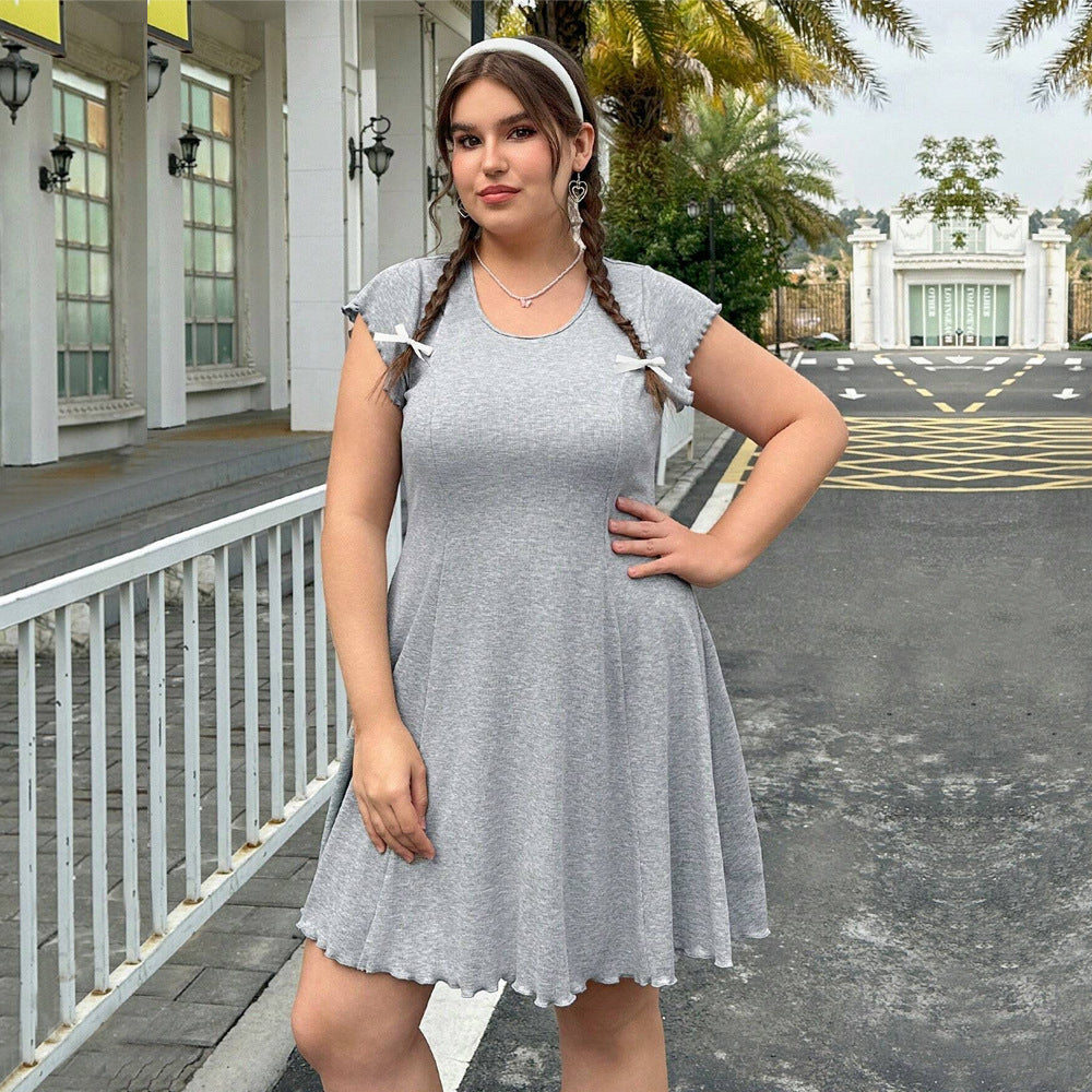 Damen lässiges Jersey-Kleid mit verspielt geschwungenem Saum und dekorativen Bändern EB