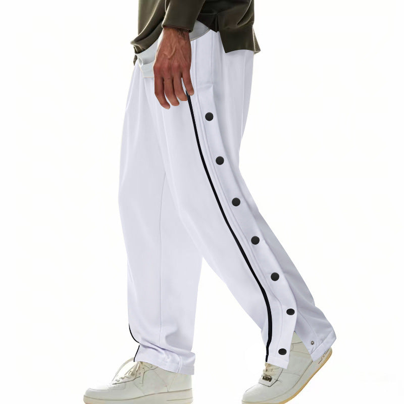 Herren nan weite Trackpants mit seitlicher Druckknopfleiste, elastischem Bund und reflektierendem Streamline-Streifen EB