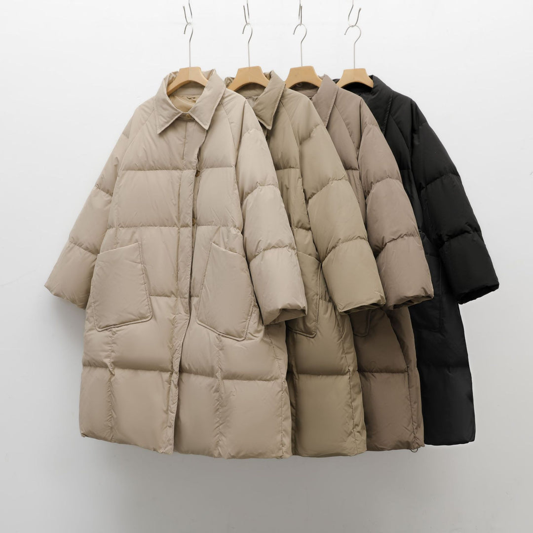 Damen Voluminöser Steppmantel mit abgerundetem Schnitt und praktischen Taschen EB
