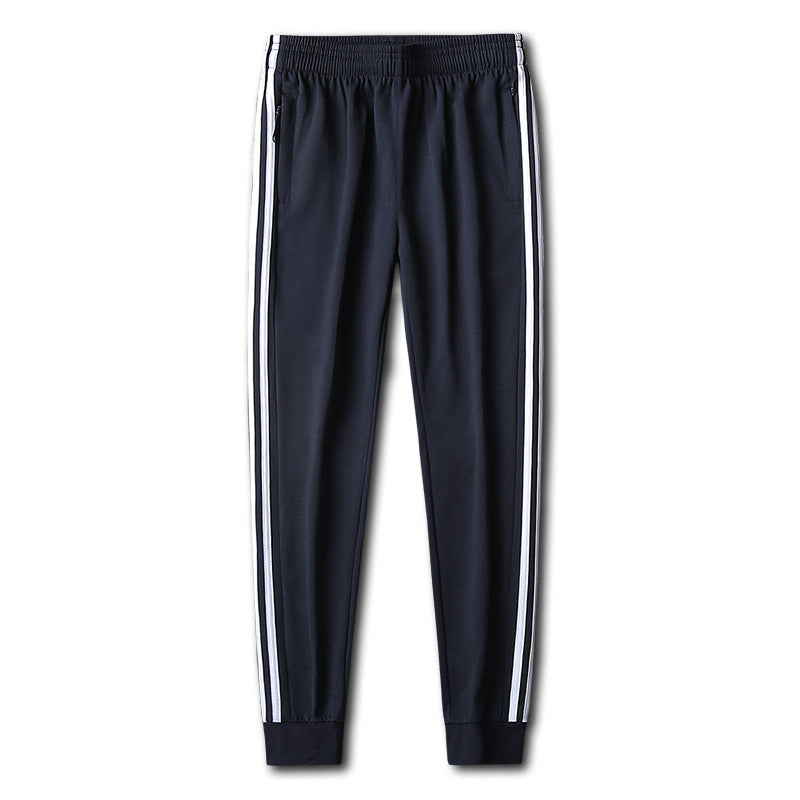 Herren Slim-Fit Trackhose mit seitlichen Kontraststreifen, Reißverschlusstaschen und elastischem Bund EB
